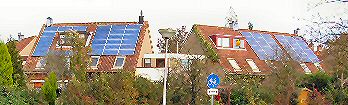 Four houses filled with PV-panels in Spijkenisse, the Netherlands. A.k.a. "De Blauwe Hoek" ("the Blue Corner"...). Ton Peter's house is second from right.